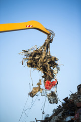 Close-up of a crane for recycling metallic waste