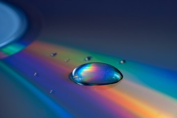 Abstract CD reflection background with water droplets