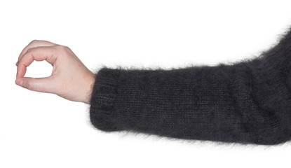 Ein Frauenarm mit einer Gestik mit der Hand