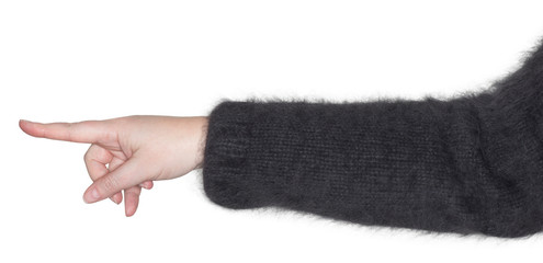 Eine Frauenhand zeigt auf etwas mit der Hand und dem Zeigefinger