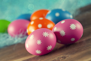 Colored Easter eggs on blue background