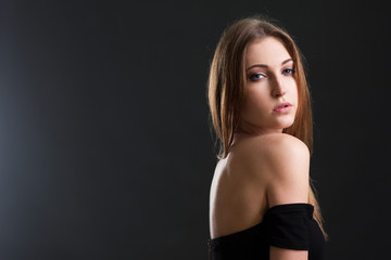 Fototapeta premium The beautiful woman with a naked back.