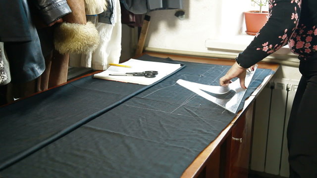 Custom Tailor Working In Workshop