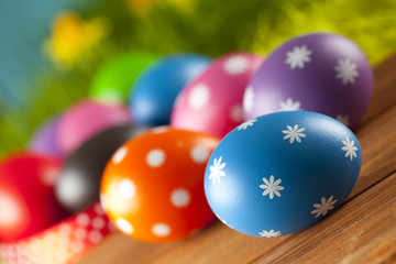 Colored Easter eggs on blue background