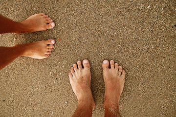 footprints in love couple in the sand on the seashore