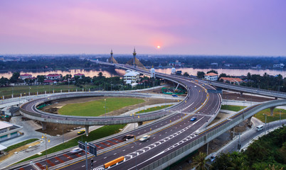 cable bridge and road street with sunset