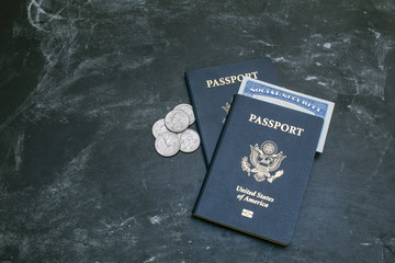 Two American passports on black background