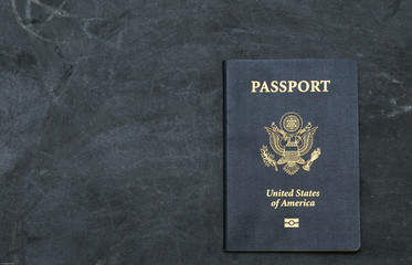 US passport on black background