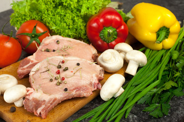 raw steak and vegetables