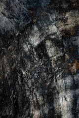 Close-up of cut rough salted granite rock (texture background)