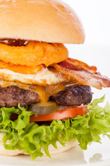 Delicious egg and bacon cheeseburger