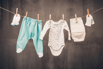 Baby clothes hanging on the clothesline.