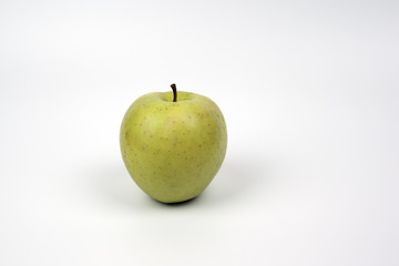 Yellow apple on white background
