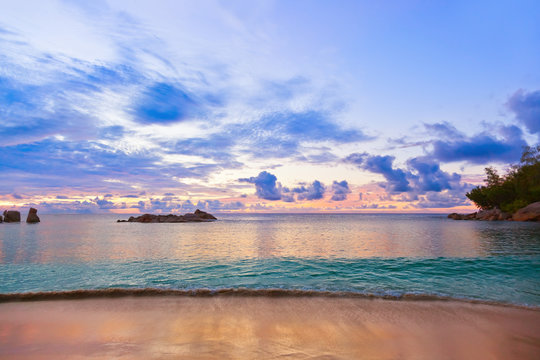 Seychelles tropical beach at sunset