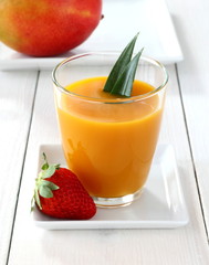 Fruity mango smoothie with strawberry