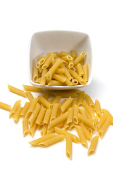 Italian pasta in a porcelain bowl on white background