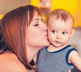 Happy Mother With Adorable Baby