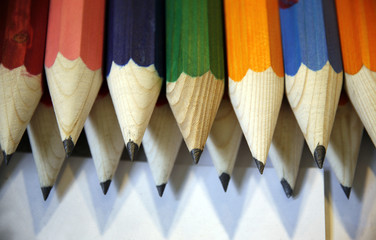 Various colored pencils in row as a creativity selective focus
