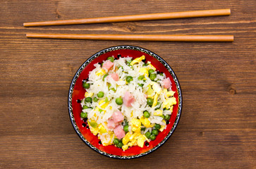 Cantonese rice on wooden table seen from above