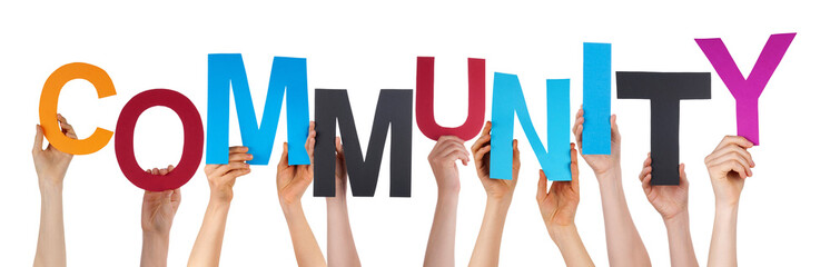 Many People Hands Holding Colorful Word Community