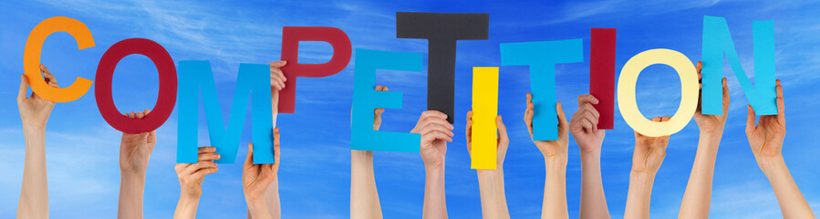 Many People Hands Holding Colorful Word Commpetition Blue Sky