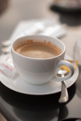 cup of fresh espresso on table