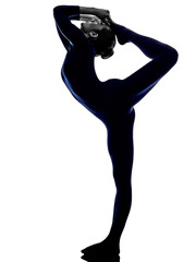 Obraz na płótnie Canvas woman Natarajasana dancer pose yoga silhouette