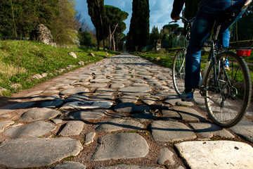 cyclist on ancient road ( Appia, Rome)