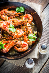 Tasty prawns served on hot pan