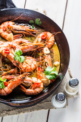 Fried shrimps served on hot pan
