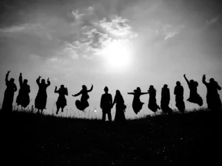 Muurstickers silhouette of people jumping © nasruleffendy
