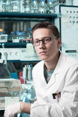 Fototapeta premium Young male researcher in the lab
