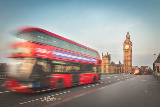 Blurred double decker with Westminster and Big Ben on background