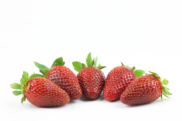 Red strawberries isolated on white background