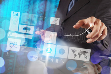 businessman hand working with new modern computer and business s