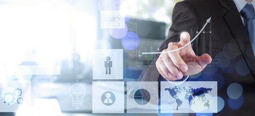 businessman hand working with new modern computer and business s