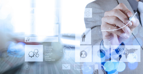 businessman hand working with new modern computer and business s