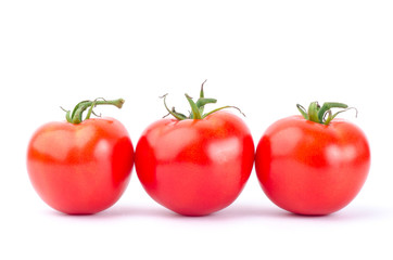Fresh tomatoes on white background