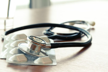 Studio macro of a stethoscope and digital tablet with shallow DO