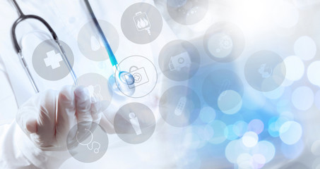 Medicine doctor hand working with modern computer interface as m
