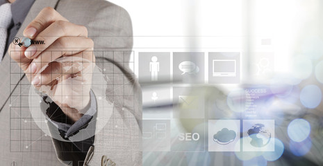 Double exposure of businessman shows modern technology as concep