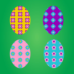 Colorful easter eggs on green background