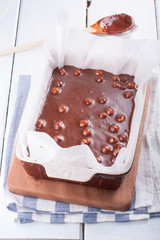 Chocolate cake (fudge) with  hazelnuts