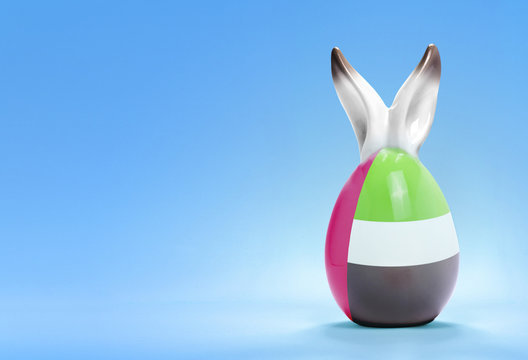 Colorful cute easter egg and the flag of United Arab Emirates .(