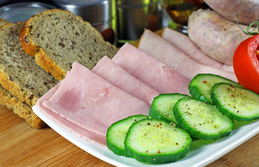 Tomatoes, cucumber, ham and white sausage