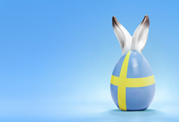 Colorful cute easter egg and the flag of Sweden .(series)