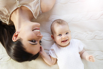 Little baby girl and her mother
