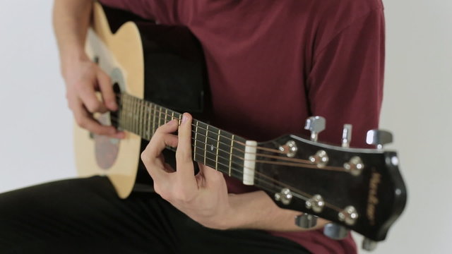 Close up of a guitar playing