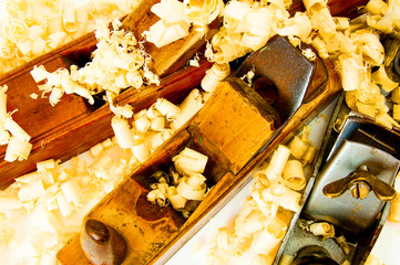 Joiner's works. Wooden shaving and plane