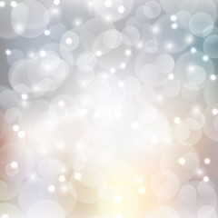 Silver bokeh abstract light background.